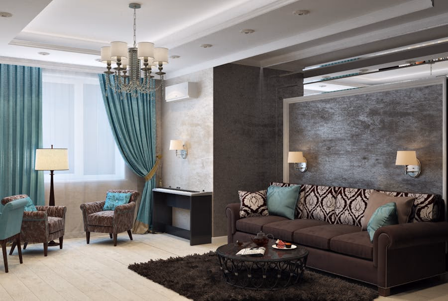 Living modern cu iluminat dramatic pe decoratiunile de perete